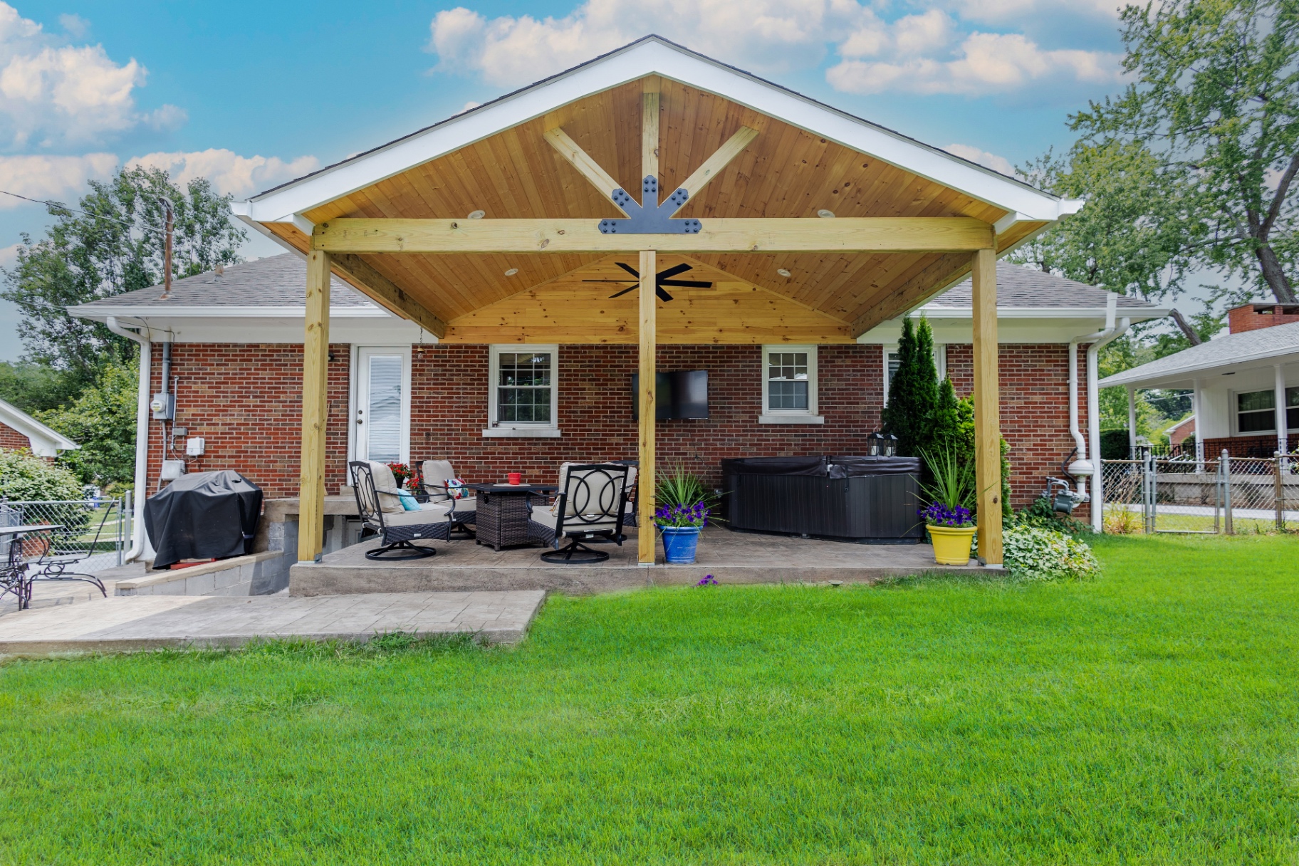 Gable-roof covered patio with cedar ceiling — Central Kentucky