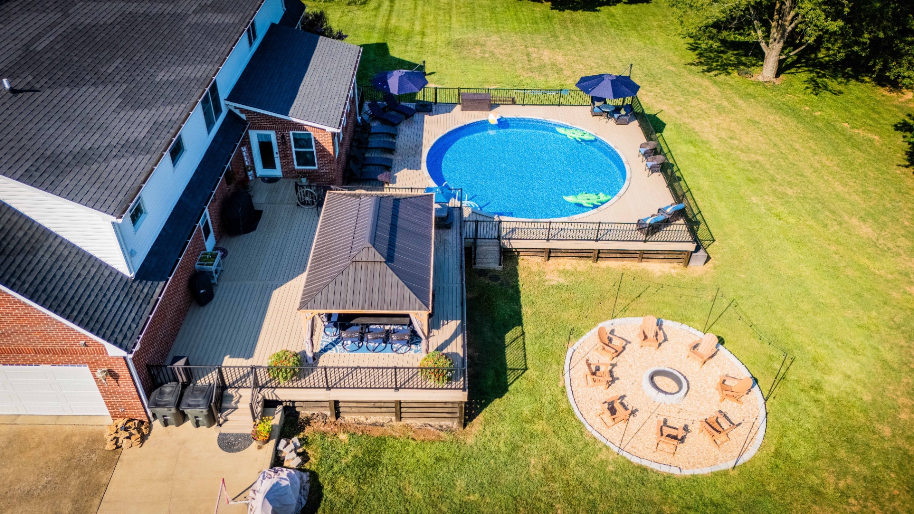 Aerial view of poolside deck with gazebo and firepit — Central Kentucky